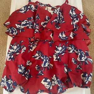Maroon tank with ruffles and blue flowers